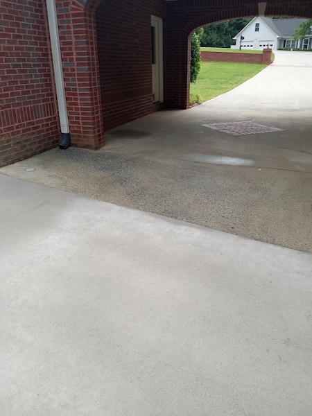 How to remove red clay stains and oil drips from your alpharetta driveway